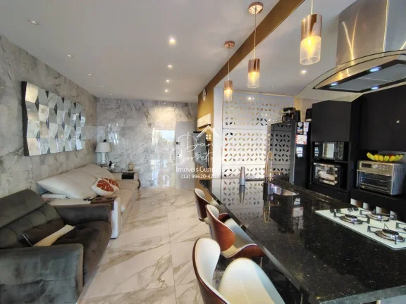 Imagem Imperdível! Apartamento de 2 quartos com suíte e 2 vagas de garagem em Pitangueiras, Guarujá-SP - 78m² de conforto e elegância!