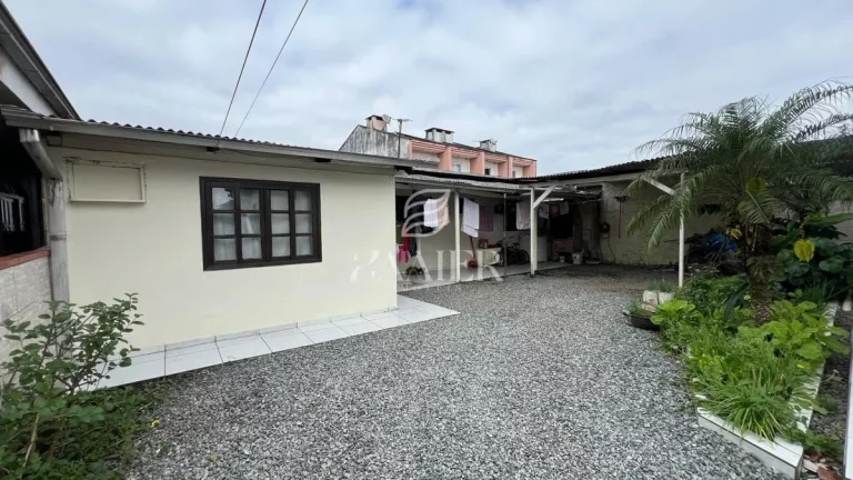 Imagem Terreno com Duas Casas Térreas – Oportunidade para Investir ou Morar Bem