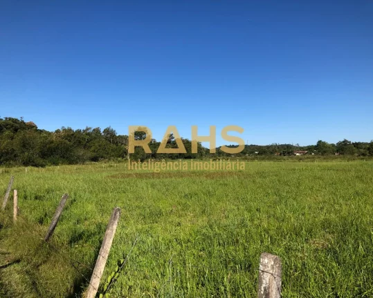 Imagem Excelente terreno urbano, em rua principal e asfaltada, faixa viária, localizado no bairro Rio Boni...