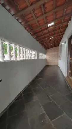 Imagem Casa para Venda em Praia Grande, Caiçara, 2 dormitórios, 1 suíte, 2 banheiros, 4 vagas