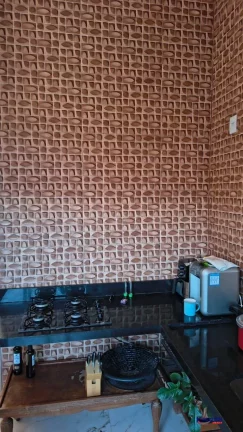 Imagem VENDO CASA DE 2 DORMITORIOS SENDO UMA SUITE CONDOMINIO FENDI - SIM