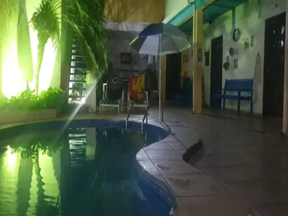 Imagem Pousada com 7 dormitórios à venda, 372 m² por R$ 1.300.000,00 - Jardim Trevo - Praia Grande/SP