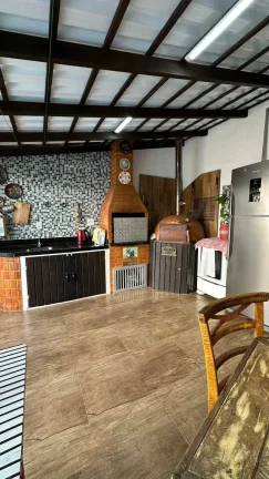 Imagem Casa com 3 suítes e 4 vagas de garagem em Balneário Camboriú/SC