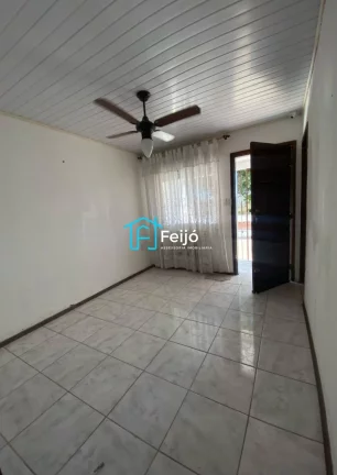 Imagem Casa 3 dormitórios com pátio e garagem - Restinga Nova