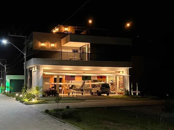 Imagem Casa em hangar com 3 suítes e 2 vagas de garagem entre Itajaí e Brusque.