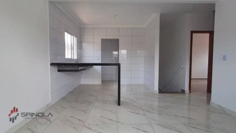 Imagem Casa com 2 dormitórios à venda, 70 m² por R$ 350.000,00 - tude basto - Praia Grande/SP