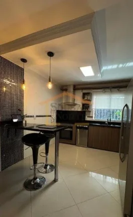 Imagem Sobrado com ambientes amplos e bem distribuídos, oferecendo conforto e acabamentos de alto padrão....