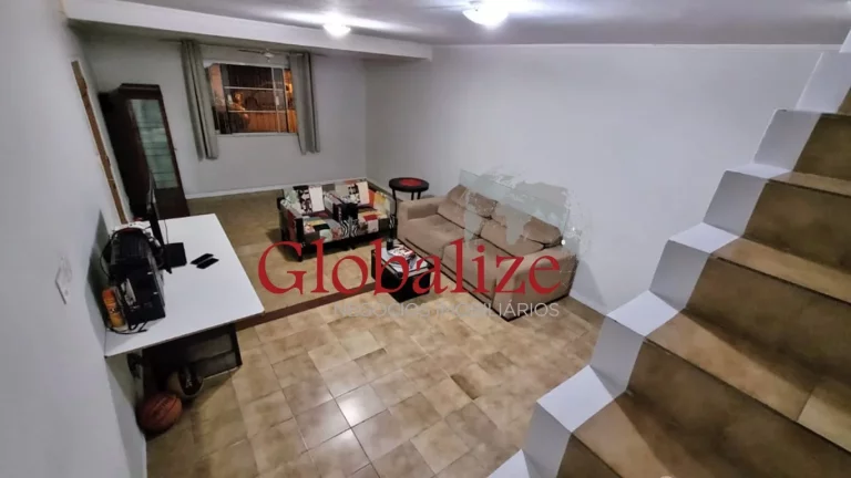 Imagem Lindo sobrado com 3 dormitórios em Santos no bairro do Estuário espaçoso com garagem para 2 carros e uma moto por R$ 856.000,00 à venda ou troca.