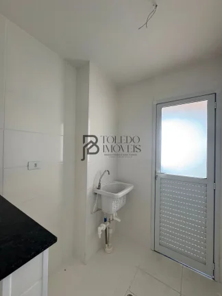 Imagem Apartamento de 2 dormitórios sendo 1 suíte, prédio frente mar no bairro Vila Mirim - Praia Grande