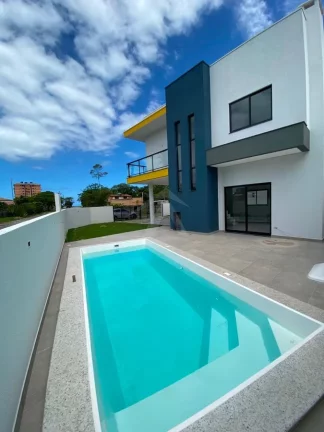 Imagem SOBRADO COM PISCINA, 3 QUARTOS SENDO 1 SUÍTE, BAL MARILUZ