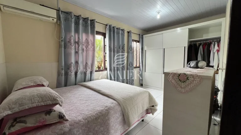 Imagem Terreno com Duas Casas Térreas – Oportunidade para Investir ou Morar Bem