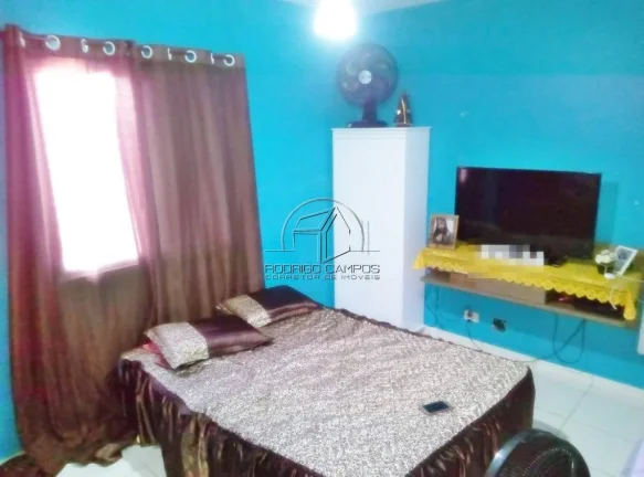 Imagem Casa Geminada à Venda em Tude Bastos, Praia Grande - 2 Quartos e Churrasqueira
