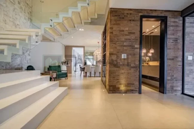 Imagem Luxuosa mansão de 4 quartos e 4 suítes no Jardim Europa, São Paulo-SP: 5 salas, 6 banheiros, 4 vagas, 415m². Venha conhecer!