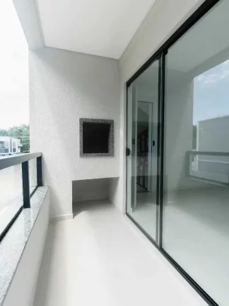 Imagem Apartamento com 2 dormitórios e 1 vaga de garagem em Navegantes/SC