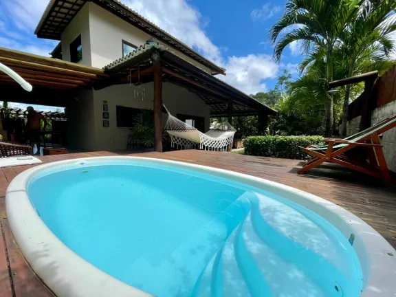 Imagem Casa à venda em Condomínio com piscina na Lagoa Aruá Praia do Forte Bahia