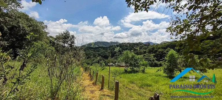 Imagem Paraíso Ecológico: Terreno com Nascente Própria e Vista para as Montanhas.
