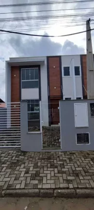 Imagem Casa com 2 Dormitórios sendo 1 suíte e 1 vaga na Garagem em Navegantes.