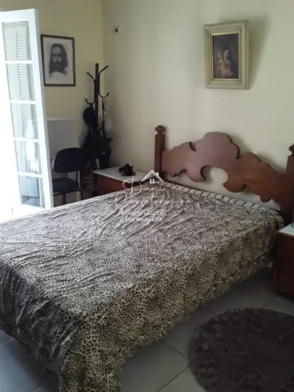 Imagem Imperdível casa à venda na Enseada, Guarujá-SP! 5 quartos, 3 suítes, 2 salas, 4 banheiros, 2 vagas de garagem. Confira!
