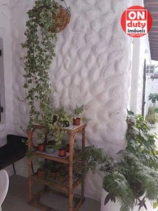 Imagem Casa à venda, 450 m² por R$ 970.000,00 - Jardim Virginia - Guarujá/SP