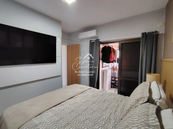 Imagem Imperdível! Apartamento de 2 quartos com suíte e 2 vagas de garagem em Pitangueiras, Guarujá-SP - 78m² de conforto e elegância!