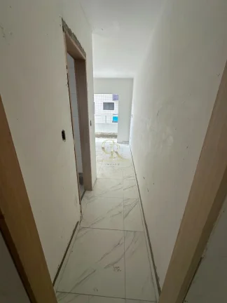 Imagem Apartamento à venda na Guilhermina, Praia Grande-SP: 1 quarto, 1 suíte, 1 sala, 2 banheiros, 51m² de área.