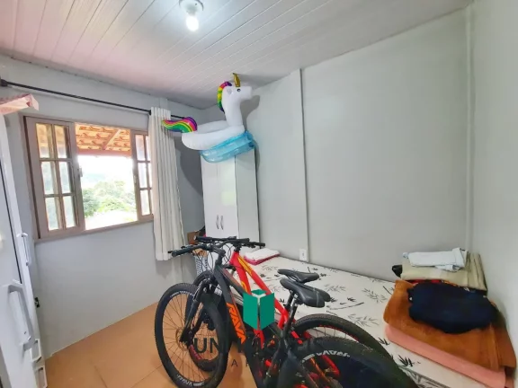 Imagem Chácara com 2 casas mais casa de caseiro, área de lazer, 10.000M² a venda na zona rural de Guarapari.