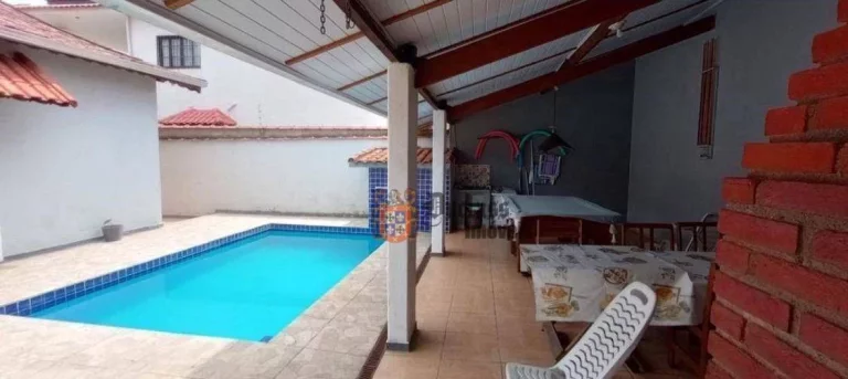 Imagem Casa com 3 dormitórios à venda por R$ 550.000 - Jardim Regina - Itanhaém/SP