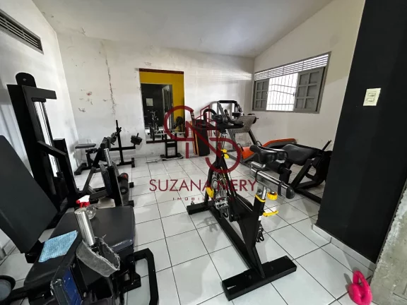 Imagem Prédio comercial com uma casa, 2 lojas e 11 kitinets