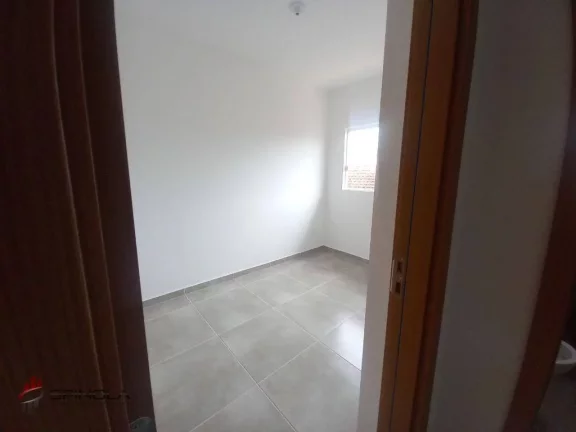 Imagem Sobrado com 2 dormitórios à venda, 55 m² por R$ 290.000,00 - Vila Caiçara - Praia Grande/SP