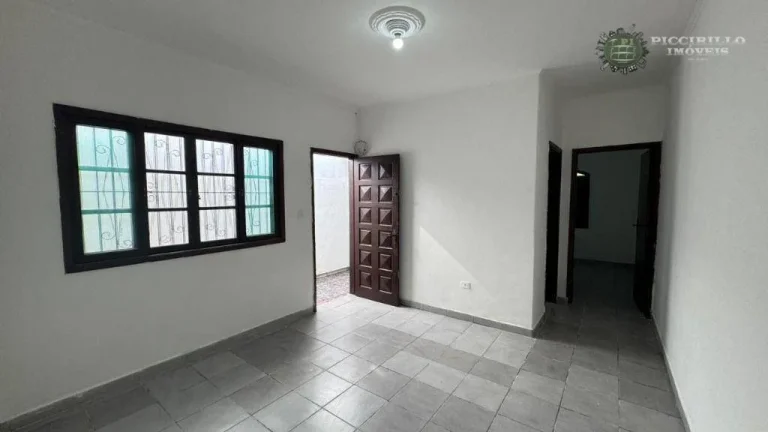Imagem Casa com 3 dormitórios à venda, 71 m² por R$ 590.000 - Vila Guilhermina - Praia Grande/SP