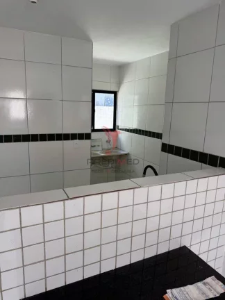 Imagem Apartamento de 2 Quartos, suite,primeiro andar, em Paratibe. Vaga de Garagem