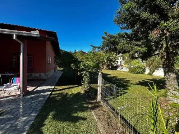 Imagem Terreno com 566,50 m² e casa no Centro de Porto Belo