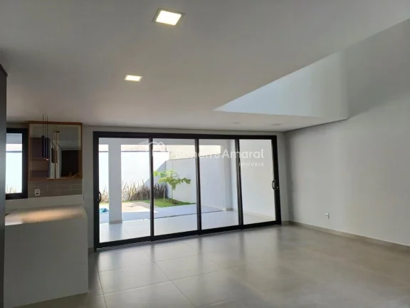 Imagem Esta linda residência combina elegância e conforto em um projeto com ambientes integrados e acabam...