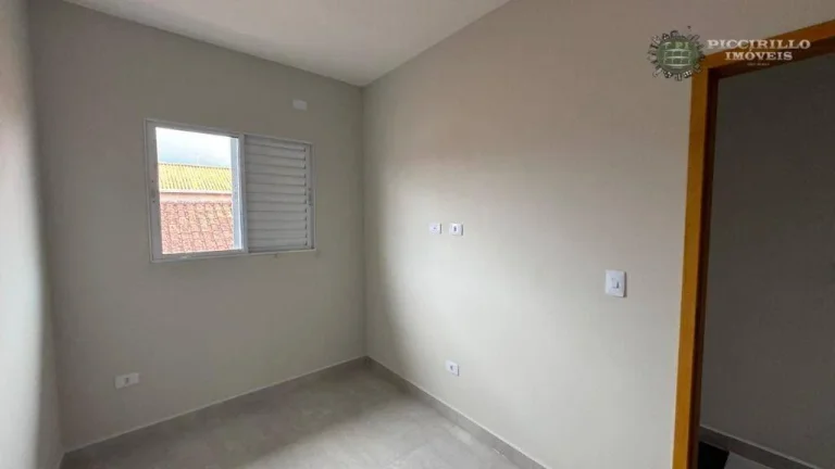 Imagem Sobrado com 2 dormitórios à venda, 49 m² por R$ 350.000 - Maracanã - Praia Grande/SP