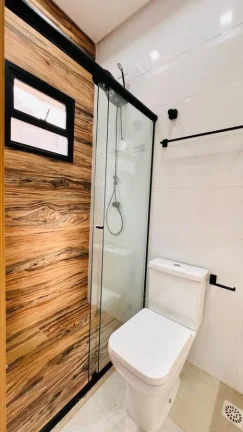 Imagem Casa para Venda em Praia Grande, Caiçara, 3 dormitórios, 2 suítes, 1 banheiro, 2 vagas