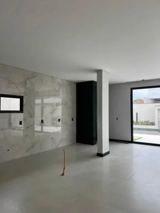 Imagem Casa nova no Condomínio Caledônia com 5 suítes e 4 vagas de garagem em Camboriú-SC
